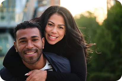 Happy young couple enjoying their home environment, showcasing the resident satisfaction at properties managed by KWPMC Midwest in Chicago.