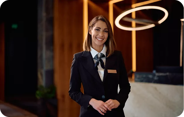 Professional concierge staff providing luxury hospitality services at a high-end Chicago residential property managed by KWPMC Midwest.