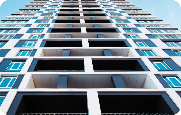 Modern high-rise residential building facade representing KWPMC Midwest's expertise in condo management companies in Chicago and large-scale associations.