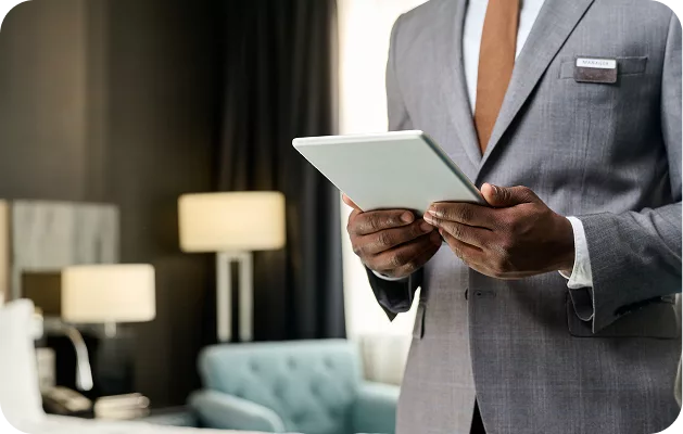 KWPMC Midwest manager using mobile technology for efficient property management and on-site association oversight in Chicago.